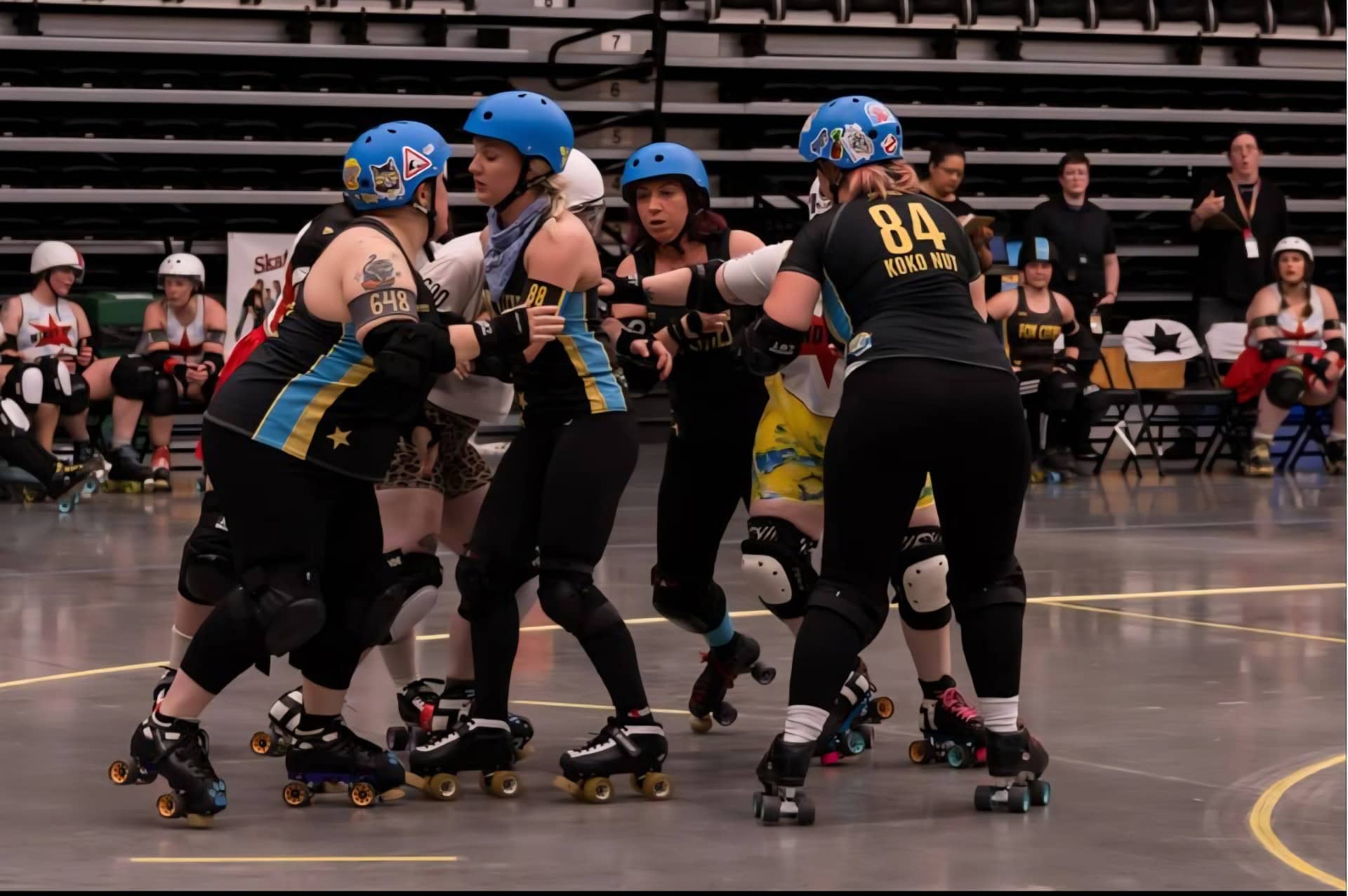 Women competing in a roller derby bout. part of Fox Cities Roller Derby